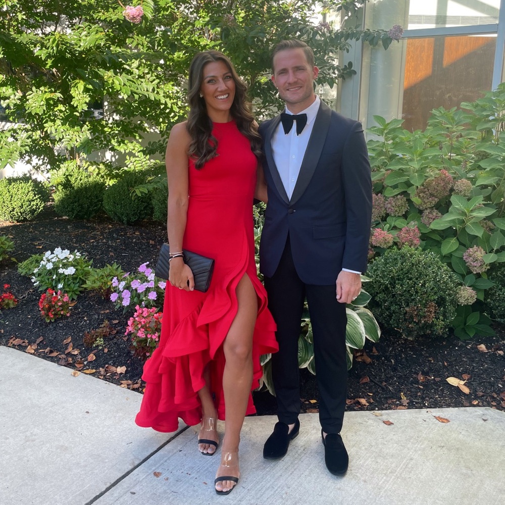 Betsy & Adam Ruffle Red Gown